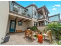 Private outdoor patio perfect for relaxation, featuring comfortable seating and lush greenery at 9255 Doherty Pl, Orlando, FL 32827