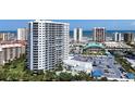 Stunning high-rise condo building featuring a pool, parking, and panoramic ocean views at 2 Oceans West Blvd # 2006, Daytona Beach Shores, FL 32118