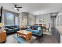 Cozy living room featuring comfortable seating and stylish décor adjacent to the dining area at 505 Terrace Ridge Cir # 505, Davenport, FL 33896