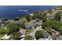 Aerial view of home, lake access, and community boat launch at 2532 Waterview Pl, Windermere, FL 34786