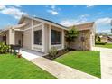 A cozy front entrance with beautiful landscaping, perfect for welcoming guests at 357 Kantor Blvd, Casselberry, FL 32707