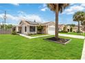 Single Gathering home with well maintained front yard and mature landscaping at 357 Kantor Blvd, Casselberry, FL 32707