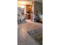 Open-concept dining area adjacent to kitchen with tile floors and lots of natural light at 4619 Salvia Dr, Orlando, FL 32839