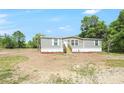 Charming single-story home featuring a well-maintained yard and a classic design at 9055 Atlas Dr, St Cloud, FL 34773