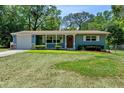 Inviting single-story home with well-maintained lawn and pleasing curb appeal at 1150 Virginia Avenue, Altamonte Springs, FL 32701