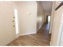 Entryway featuring tile floors, neutral paint, and a coat rack to your right at 4336 Cloverleaf Pl, Casselberry, FL 32707