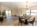 Open-concept living and dining area filled with natural light and neutral paint throughout at 4336 Cloverleaf Pl, Casselberry, FL 32707
