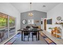 Cozy dining area featuring modern lighting and stylish decor with outdoor access at 4918 Gifford Blvd, Orlando, FL 32821