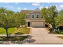 Charming two-story home with a well-manicured lawn and a spacious two-car garage at 528 Seven Oaks Blvd, Winter Springs, FL 32708