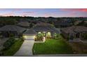 Expansive aerial view showcases the property's manicured lawn and desirable neighborhood at 6758 Hillis Dr, Lakeland, FL 33813