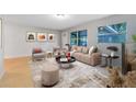 Inviting living room with neutral tones, stylish furniture, and ample natural light at 226 S Apollo Dr, Apopka, FL 32703