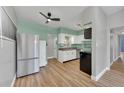 Bright, updated kitchen features stainless steel appliances and modern cabinetry at 2903 E Michigan St, Orlando, FL 32806