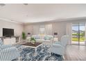 Bright living room with plenty of space and natural lighting at 3028 Water Clover Ct, Apopka, FL 32712