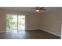 Inviting living room filled with natural light and offers seamless indoor-outdoor living at 3060 George Mason Ave # 10C, Winter Park, FL 32792