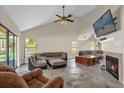 Spacious living room with a fireplace, high ceilings, and natural light at 368 Amethyst Ct, Lake Mary, FL 32746