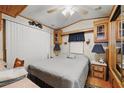 Comfortable bedroom with natural light, side tables, and closet at 9000 Us Highway 192 # 624, Clermont, FL 34714