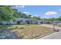 Inviting home with curb appeal, featuring a well-manicured yard and a clear view of the facade at 132 W Lauren Ct, Casselberry, FL 32730
