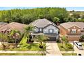 A beautiful home with lush green backyard in a quiet neighborhood at 460 Crownclover Ave, Orlando, FL 32828