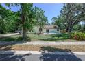 A beautiful single-story home with well-maintained landscaping and a spacious yard at 1635 Magnolia Ave, South Daytona, FL 32119