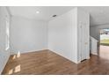 Bright living room featuring sleek hardwood floors and fresh paint at 2730 Parkfield Rd, St Cloud, FL 34772