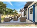 Back deck featuring outdoor seating area with comfortable seating and dining at 358 Prevo Dr, Apopka, FL 32712