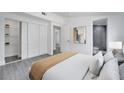 Cozy bedroom featuring closet, connecting door and ensuite bathroom, plus neutral paint and flooring at 358 Prevo Dr, Apopka, FL 32712