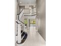Inviting foyer featuring a staircase, tile flooring and a chandelier at 12173 Aztec Rose Ln, Orlando, FL 32827