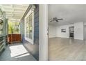 Open concept living room with hardwood floors and neutral paint, creating a bright space at 1506 37Th St, Orlando, FL 32839