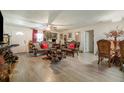 Spacious living room with new flooring, with updated lighting and ornate furnishings at 1506 37Th St, Orlando, FL 32839