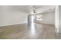 Bright and spacious living room with wood-look floors and ample natural light at 1506 37Th St, Orlando, FL 32839