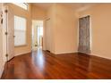 Bright bedroom with hardwood floors, a large window and two large closets at 4522 Weeping Willow Cir, Casselberry, FL 32707