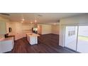 Spacious kitchen with stainless steel appliances and an island opens to a large living area at 1032 Morfontaine St, Daytona Beach, FL 32124