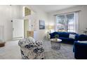Inviting living room filled with natural light, enhanced by stylish sofas and neutral decor at 2712 Lido Key Dr, Kissimmee, FL 34747
