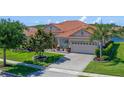 Delightful single-story home featuring a beautiful tile roof and well-maintained landscaping at 2721 Swoop Cir, Kissimmee, FL 34741