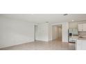 Spacious living room with tile flooring providing a blank canvas for personalization and enjoyment at 4728 Jasmine Cir, Leesburg, FL 34748