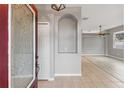 Inviting entryway showcasing tile flooring, a decorative niche, and a glimpse into the open-concept living space at 600 Rob Roy Dr, Clermont, FL 34711