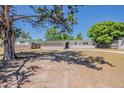Single-story home showcasing a brick exterior and a well-maintained front lawn at 3718 Mitchell Rd, Orlando, FL 32808