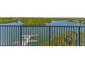 Enjoy stunning views of the waterway and docks from the private balcony railing at 5 Riverwalk Dr # 604, New Smyrna Beach, FL 32169