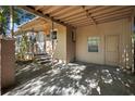 This home has a convenient covered carport, easy access to the front door, and is surrounded by mature landscaping at 1207 Cole Rd, Orlando, FL 32803