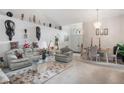 Inviting living room space featuring neutral decor, providing a cozy atmosphere for relaxation at 122 Oak View Pl, Sanford, FL 32773