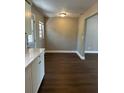 A dining room with stylish flooring and ample natural light, ready for your personal touch at 2520 Park Lake Dr, Deland, FL 32724