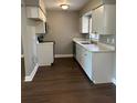 Bright kitchen featuring sleek countertops and modern appliances for effortless meal prep at 2520 Park Lake Dr, Deland, FL 32724