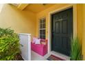 Cozy front porch featuring a charming seating area, perfect for relaxing and enjoying the neighborhood view at 3759 Collingwood Ln, Oviedo, FL 32765