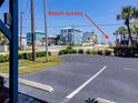 Image showcases beach access from the property at 865 Ladyfish Ave # C104, New Smyrna Beach, FL 32169