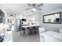 A lovely kitchen and dining room in a modern-styled condo at 865 Ladyfish Ave # C104, New Smyrna Beach, FL 32169