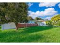 Charming single-story home with a well-maintained lawn and carport at 3024 Sutton Dr, Orlando, FL 32810
