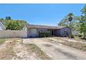 Charming single-story home with a minimalist landscape at 525 E Foothill Way, Casselberry, FL 32707