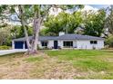 Charming single story home featuring a well-maintained yard with mature trees at 120 W Trade Winds Rd, Winter Springs, FL 32708