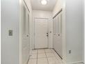 Bright foyer with tiled floors and closet space at 1230 Westside Dr, Winter Garden, FL 34787