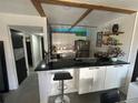 Well-designed kitchen with breakfast bar that opens to the rest of the home with stainless steel appliances at 1935 Conway Rd # T6, Orlando, FL 32812